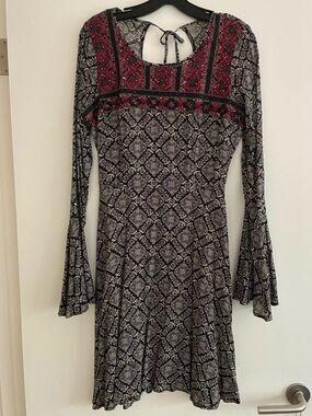 Black and Magenta Dress with Embroidered accents.